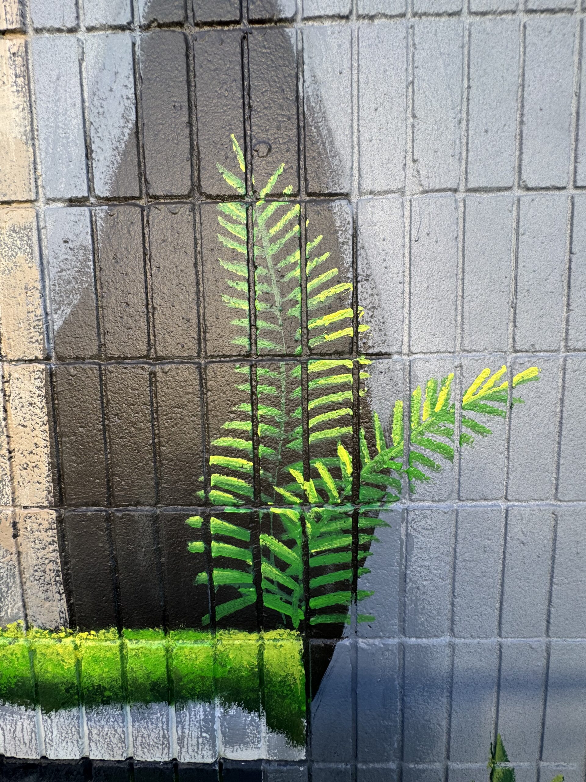 Wao Kānaka mural closeup of fern